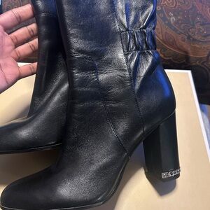 Black leather booties